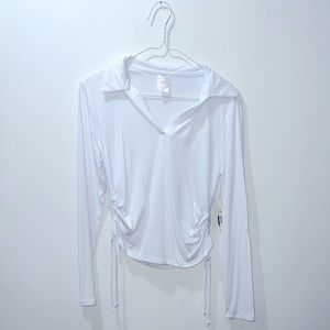 No Boundaries White Long Sleeve Top. Brand new with tags. Size medium.